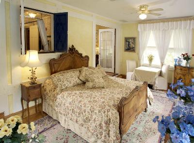Blue Garden Suite - three room suite with garden and pool views, king bed, double jacuzzi, fireplace