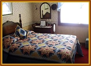 Our Blue Room is decorated with walnut antiques.