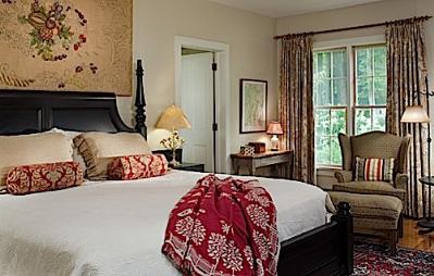 Romantic Thorsden room features whirlpool and fireplace
