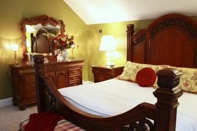 For top floor elegance, choose the Elizabeth's Attic . A grand King bed, cozy fireplace, huge bath.