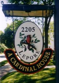 A Cardinal House Sign